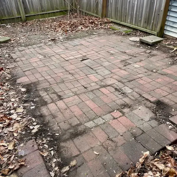 Worn Fort Myers patio pavers before restoration
